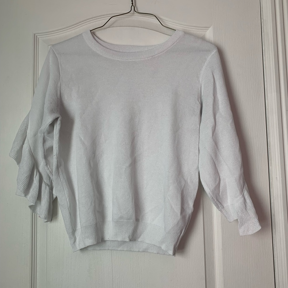 This sweater is so much fun with the ruffles going along the top of the sweater!